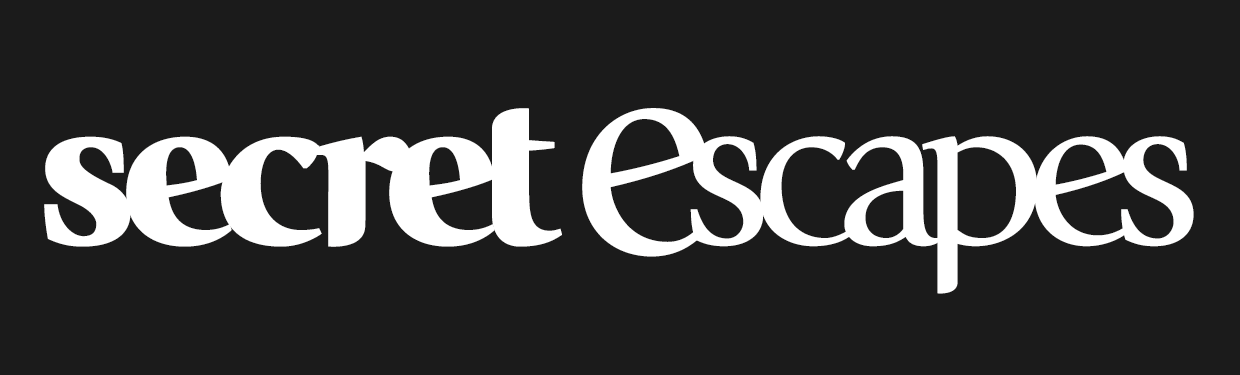 Logotipo de escapes secretos